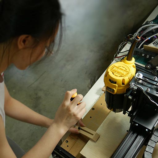 Girls with Tools 13 fixing xcarve bokeh 512